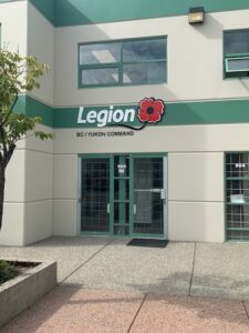 Front office of the Legion Foundation BC Yukon Command. Includes the logo of the organization above two doors.