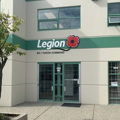 Front office of the Legion Foundation BC Yukon Command. Includes the logo of the organization above two doors.